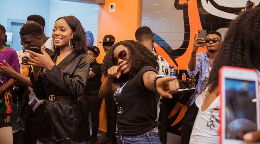 Many people on pizza store